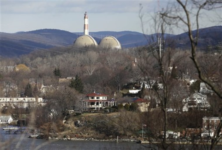 Reactor containment domes of the Indian Point nuclear power plant in Buchanan, N.Y., rise above homes just north of Verplanck.